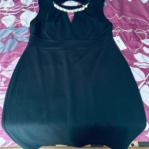 Black sleeveless dress never been worn.